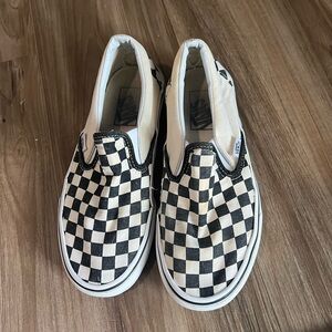 Checkered vans slip on